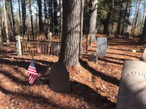 small historic graveyard in the woods